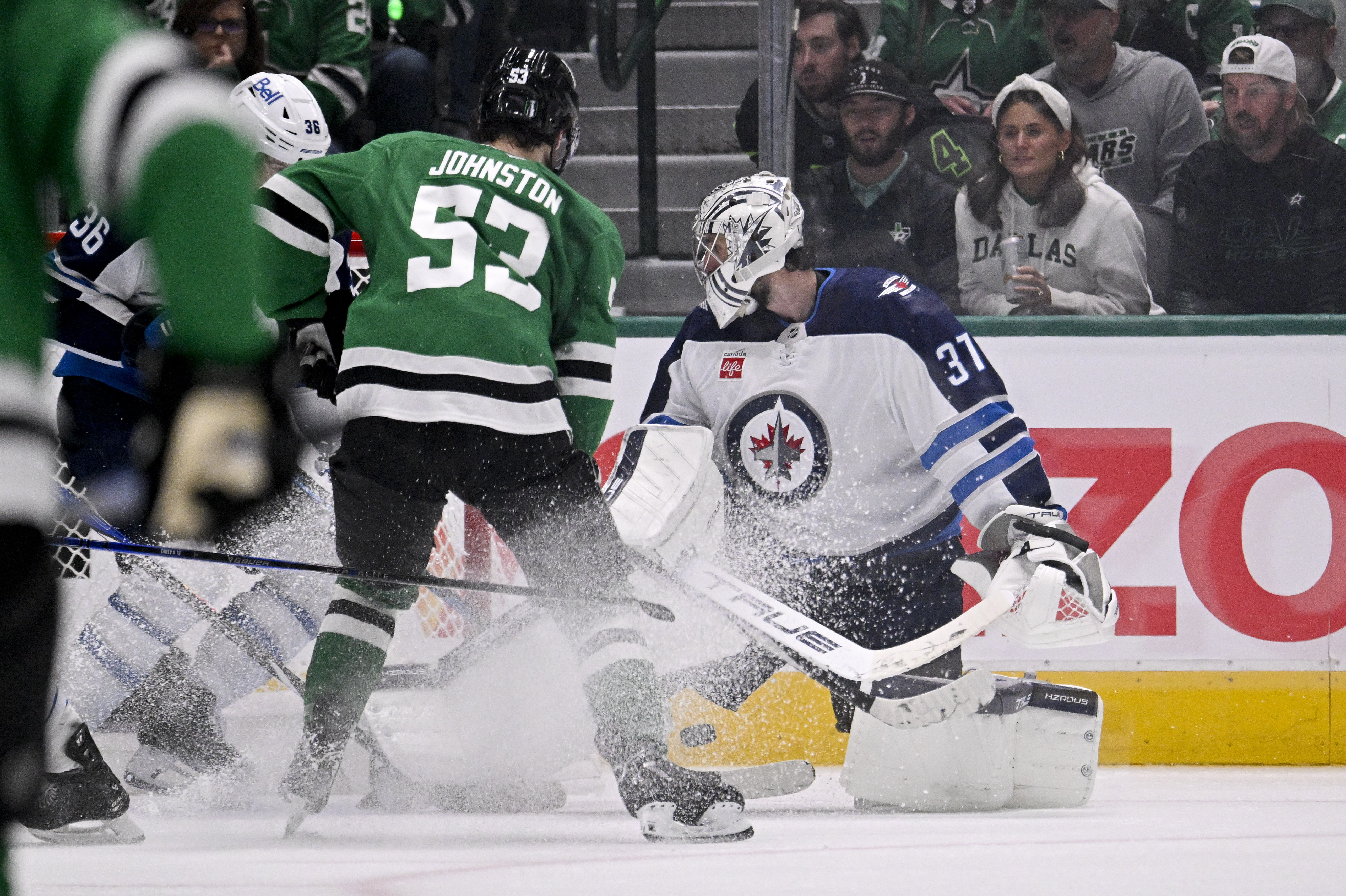 Connor Hellebuyck "propelled" the puck into his own net - Source: Imagn